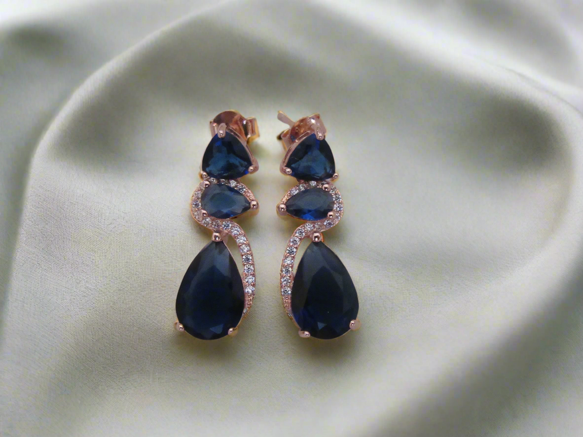 Blue stone twirl studs
