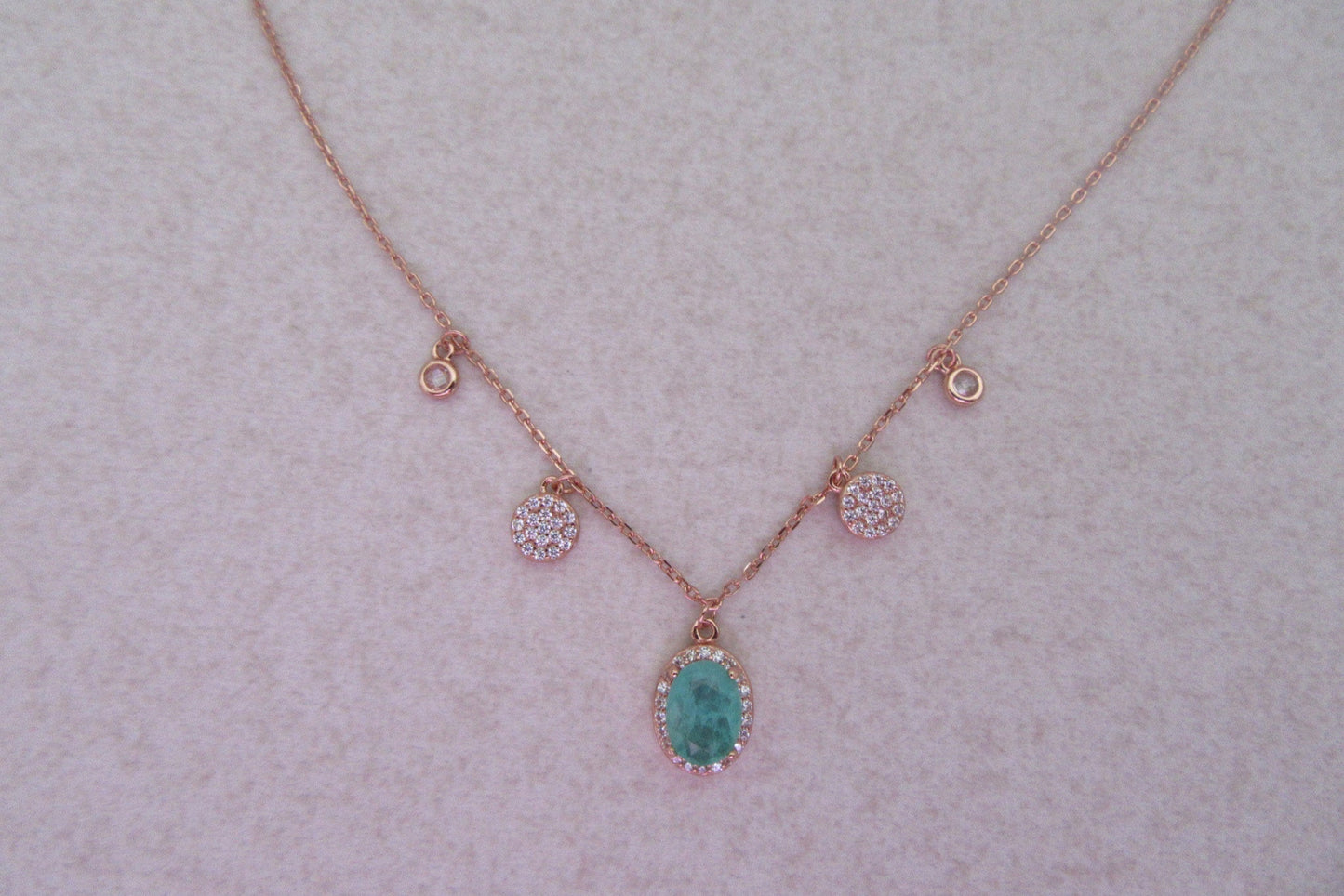 Green oval stone set