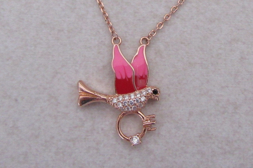 Bird with ring chain and pendant