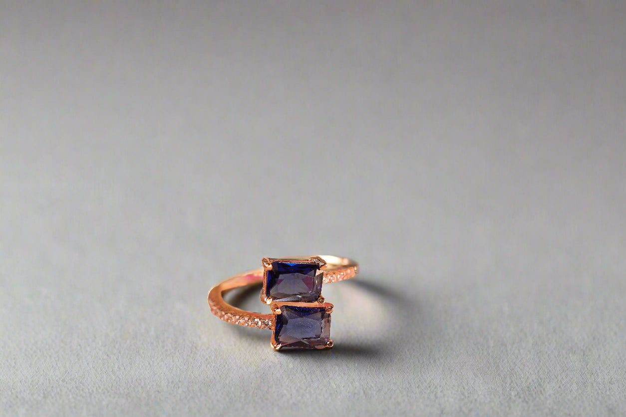 Rose gold and blue stone ring