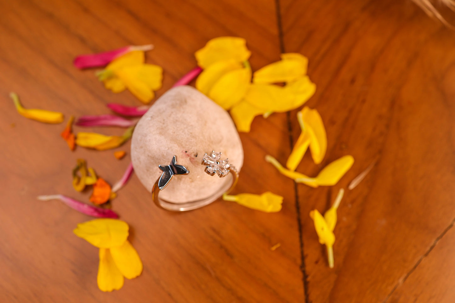 Flower and silver butterfly ring