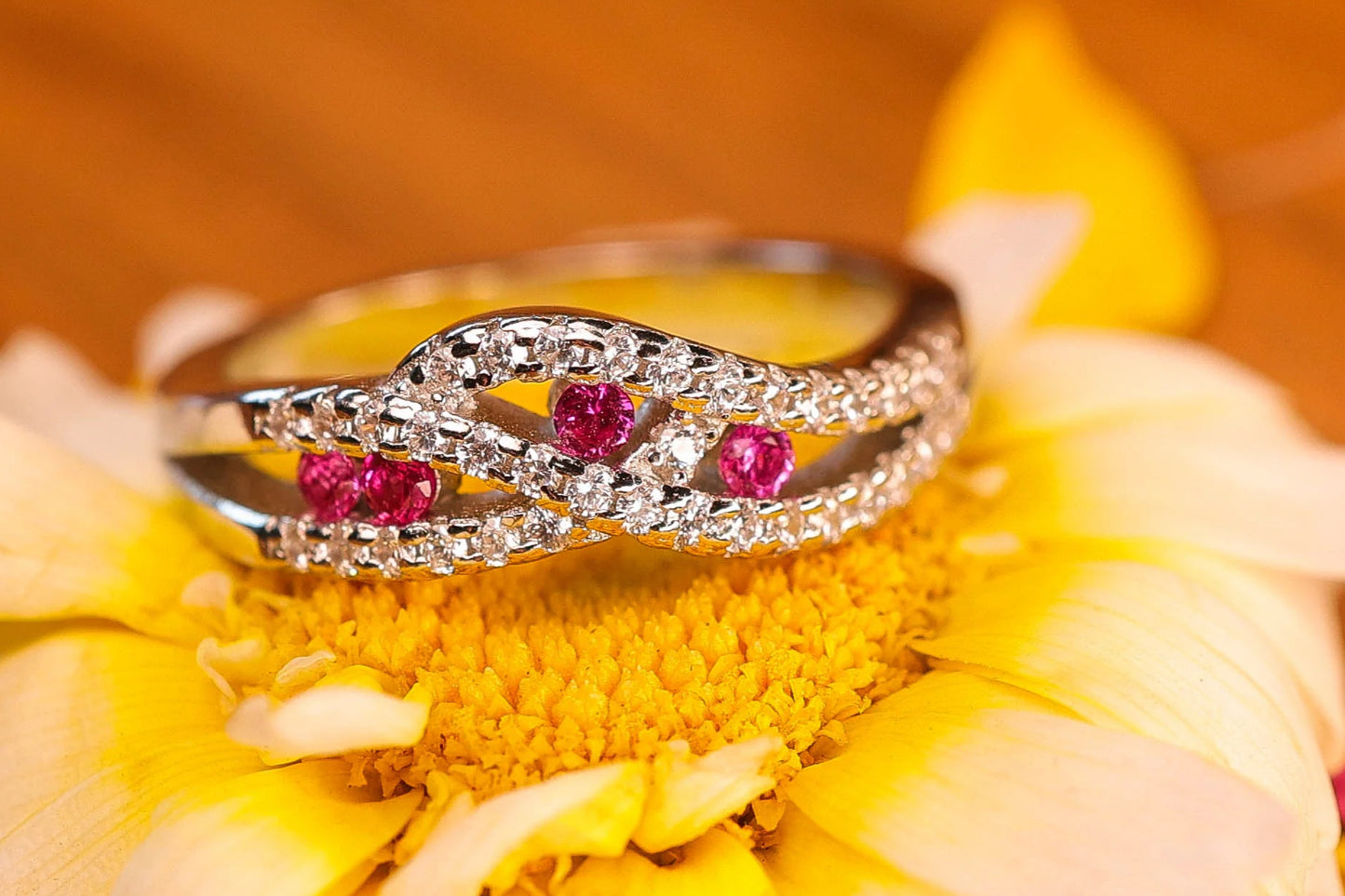 Silver crown with pink stones ring