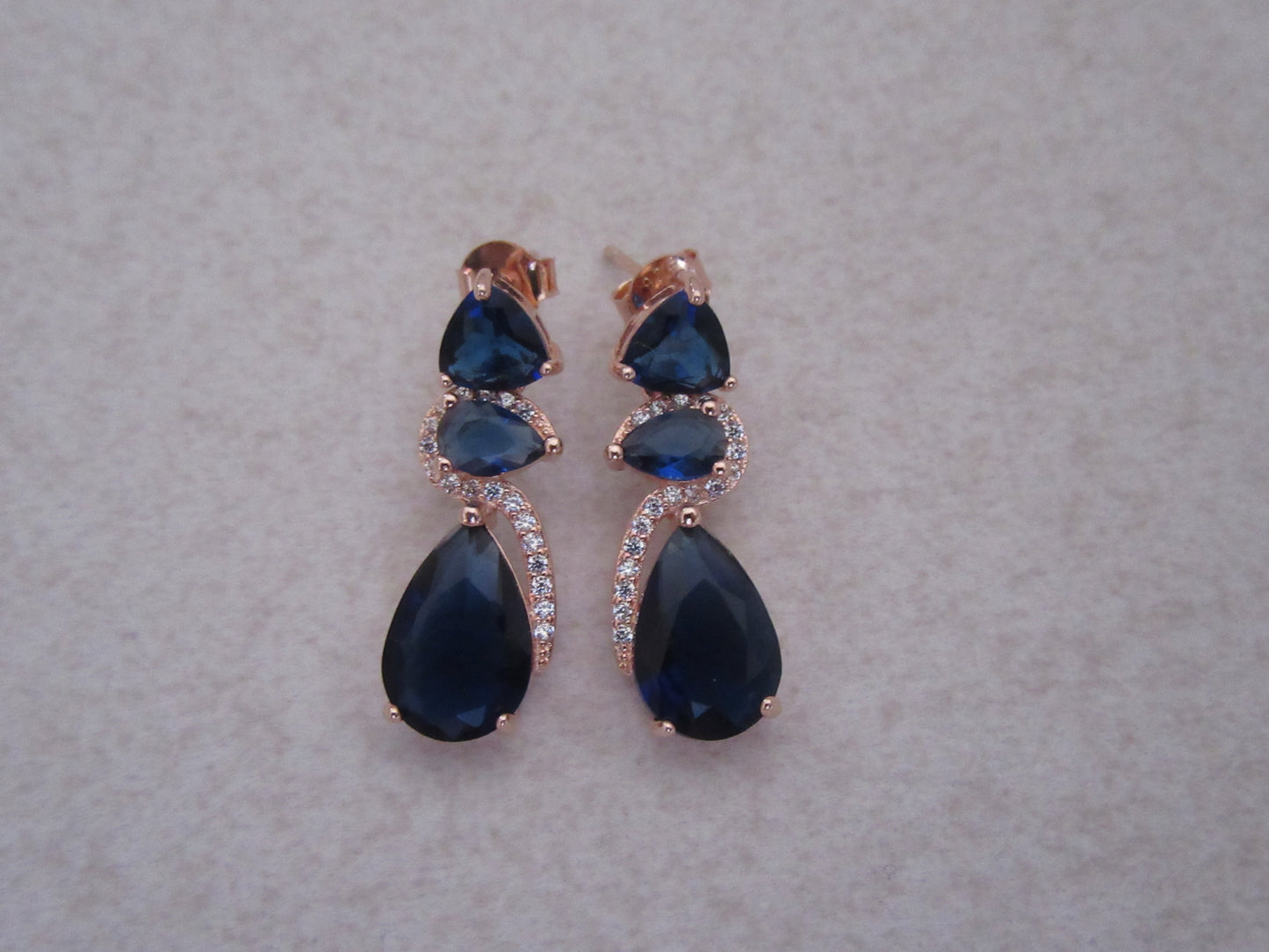 Blue stone twirl studs