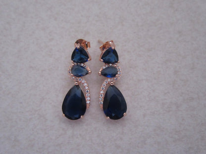 Blue stone twirl studs