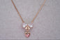 Bow with a heart charm chain and pendant
