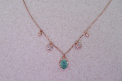 Green oval stone set